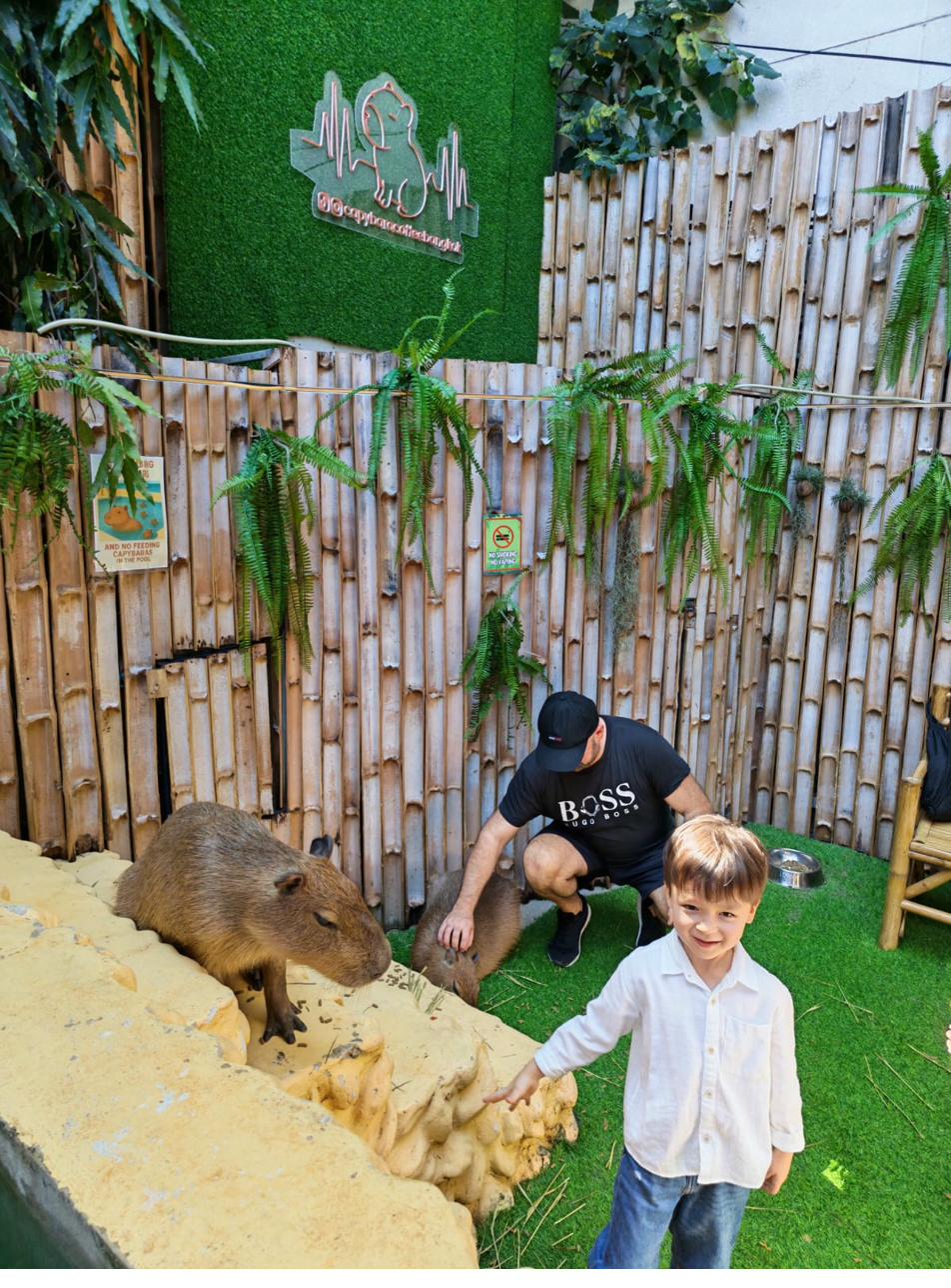 Chris with capybaras